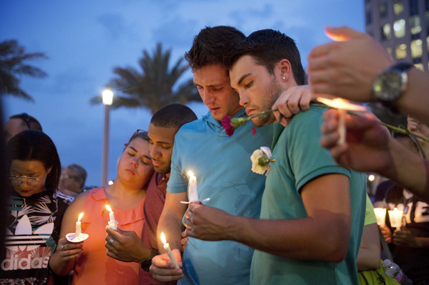 A candlelight vigil for the victims of a mass shooting at the Pulse nightclub, June 13, 2016, in Orlando, Fla. (AP/David Goldman)