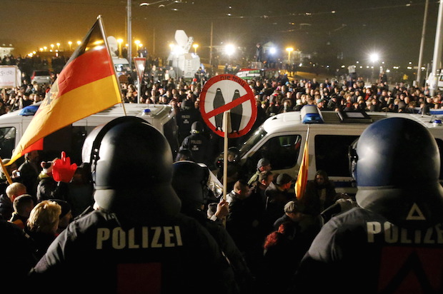 Right-wing protesters at an anti-immigration demonstration organized by the racist movement Patriotic Europeans Against the Islamisation of the West, or Pegida, in Dresden, Germany on October 19, 2015 (Reuters/Fabrizio Bensch)