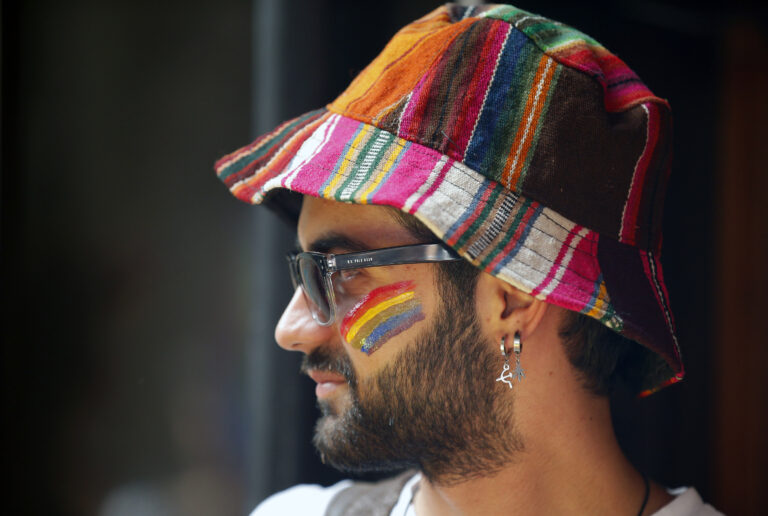 People gather to protest against the ban on the gay pride march, off Istiklal Avenue, central Istanbul's main shopping road, Sunday, June 19, 2016. Turkish police fired tear gas and rubber bullets to disperse demonstrators who gathered for a gay pride rally in Istanbul despite a government ban over security concerns. (AP Photo/ Emrah Gurel) (AP)