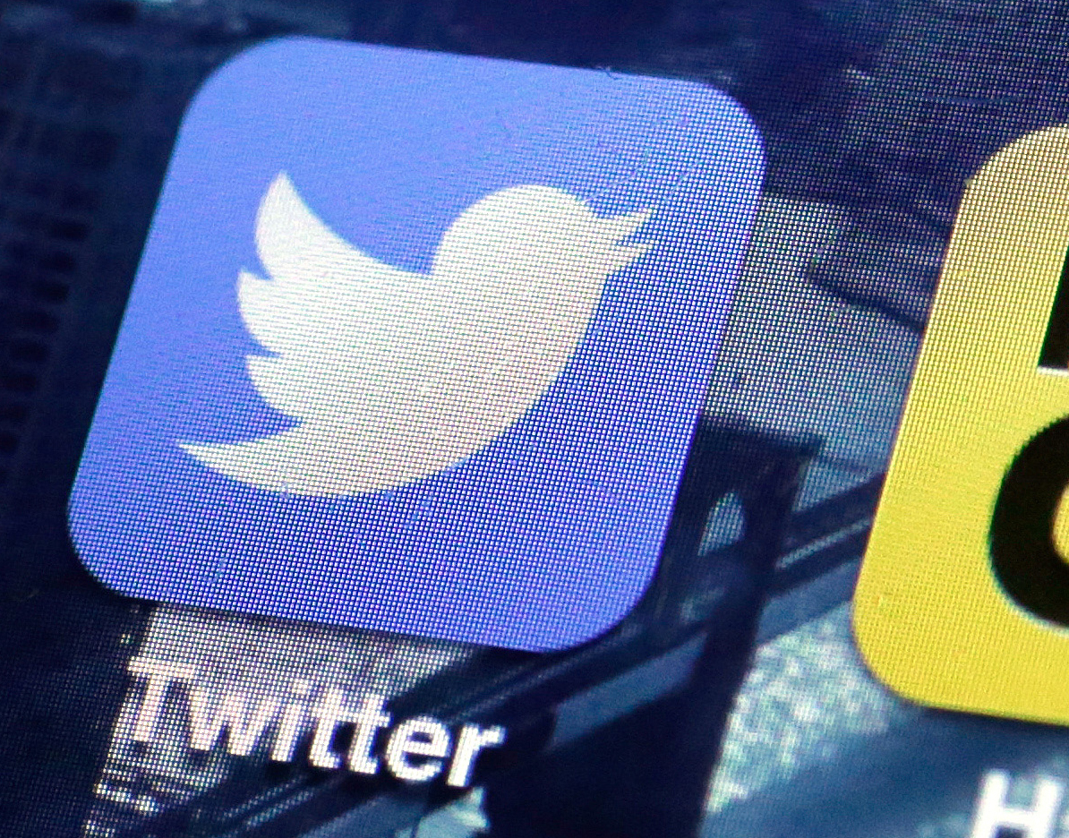 FILE - This Friday, Oct. 18, 2013, file photo, shows a Twitter app on an iPhone screen, in New York. A security website said it received a cache of 32 million Twitter passwords, which Twitter said did not come from a direct breach of its systems. Instead, malware that lifted stored passwords from browsers appears to be the culprit. (AP Photo/Richard Drew, File) (AP)
