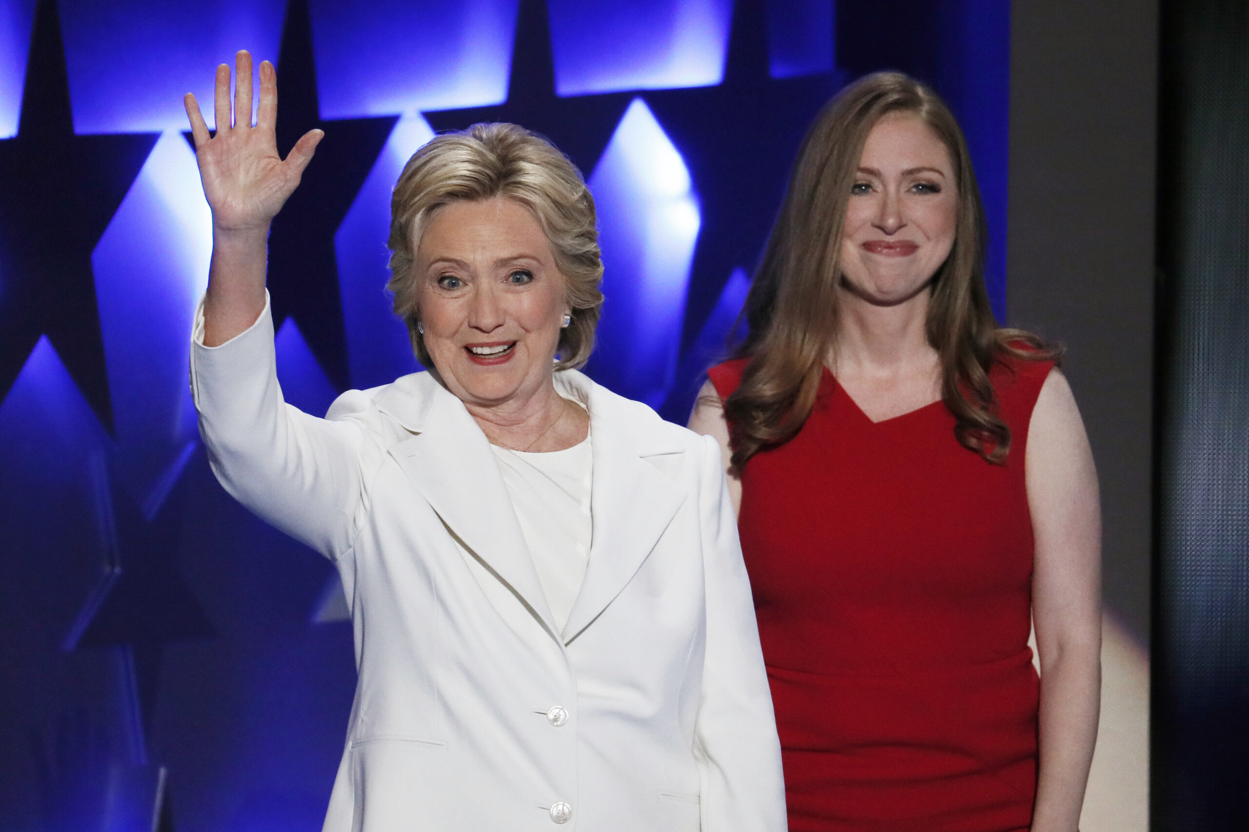 Democratic presidential nominee Hillary Clinton waves as her daughter Chelsea Clinton looks on during the final day of the Democratic National Convention in Philadelphia , Thursday, July 28, 2016. (AP Photo/J. Scott Applewhite) (AP)