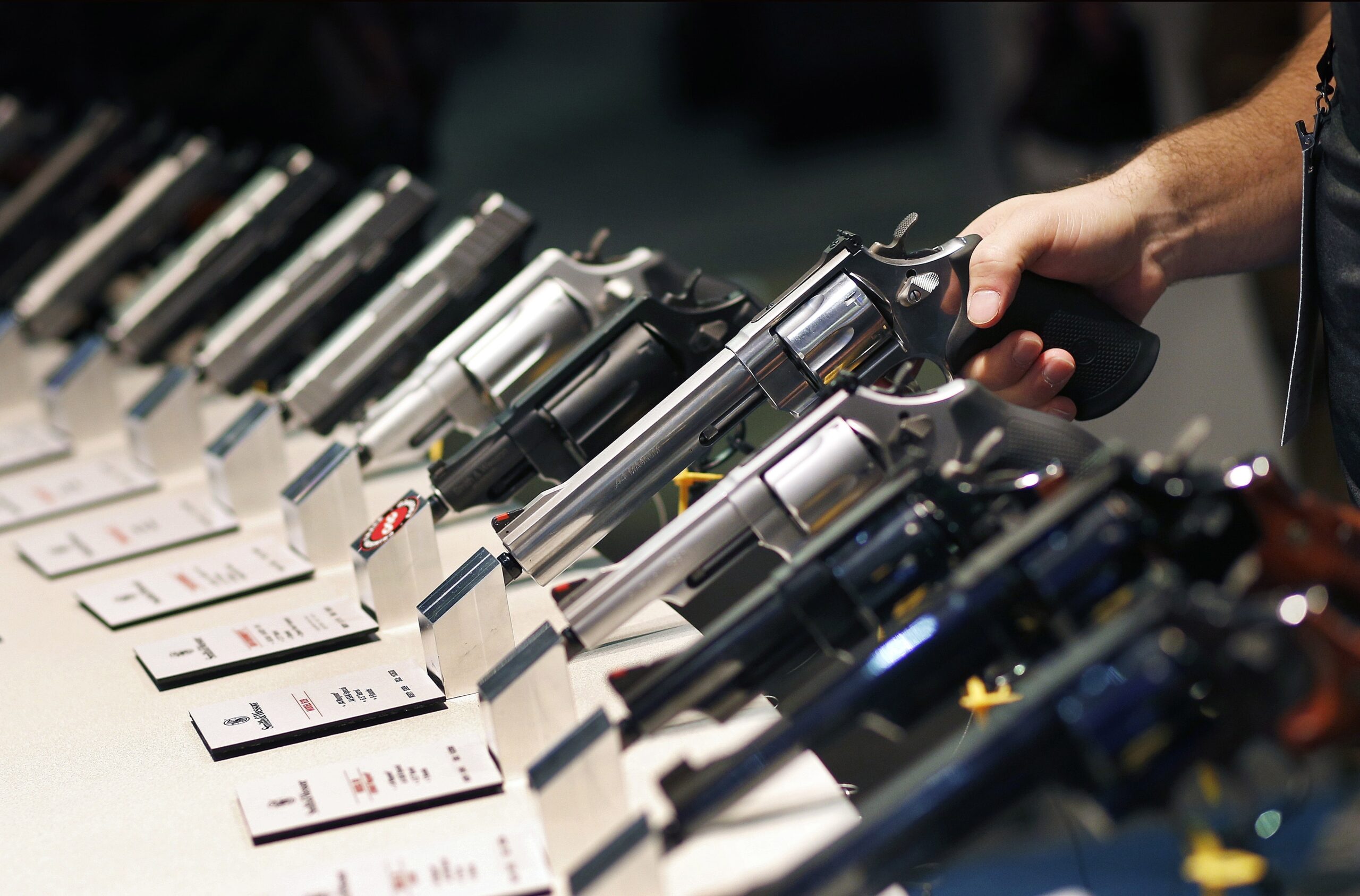 FILE - In this Jan. 19, 2016 file photo, handguns are displayed at the Smith & Wesson booth at the Shooting, Hunting and Outdoor Trade Show in Las Vegas. (AP)