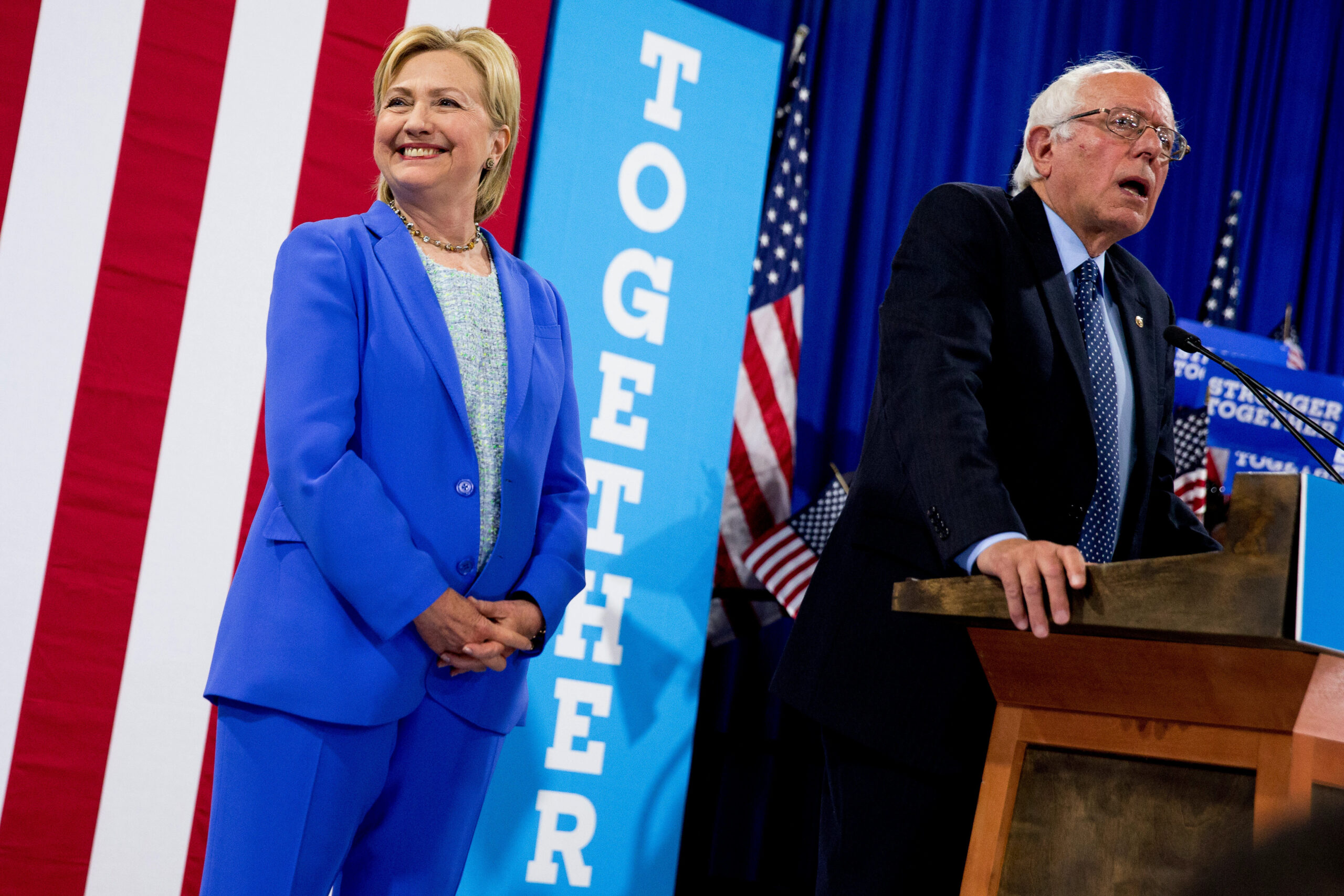 Democratic presidential candidate Hillary Clinton listen as Sen. Bernie Sanders, I-Vt. speaks during a rally in Portsmouth, N.H., Tuesday, July 12, 2016, where Sanders endorsed Clinton for president. (AP Photo/Andrew Harnik) (AP)