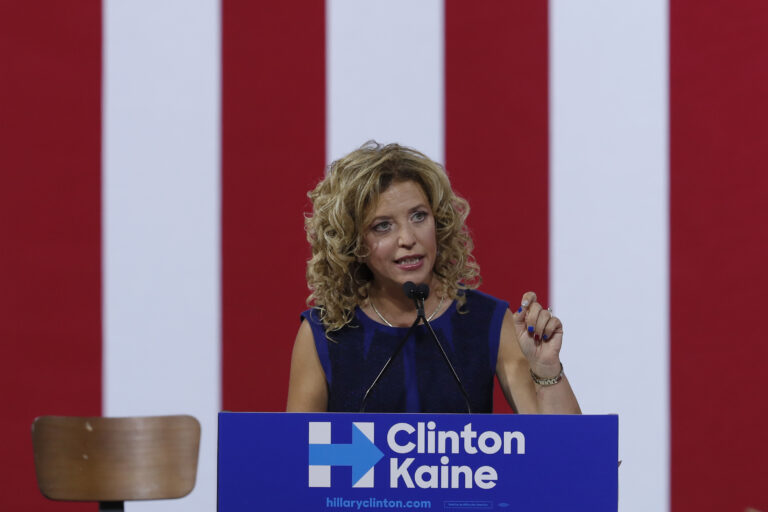 In this Saturday, July 23, 2016 photo, DNC Chairwoman, Debbie Wasserman Schultz speaks during a campaign event for Democratic presidential candidate Hillary Clinton during a rally at Florida International University Panther Arena in Miami. On Sunday, Wasserman Schultz announced she would step down as DNC chairwoman at the end of the party's convention, after some of the 19,000 emails, presumably stolen from the DNC by hackers, were posted to the website Wikileaks. (AP Photo/Mary Altaffer) (AP)