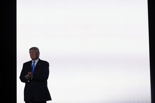 Donald Trump appears onstage to introduce his wife Melania at the Republican National Convention in Cleveland, July 18, 2016. (Reuters/Brian Snyder)