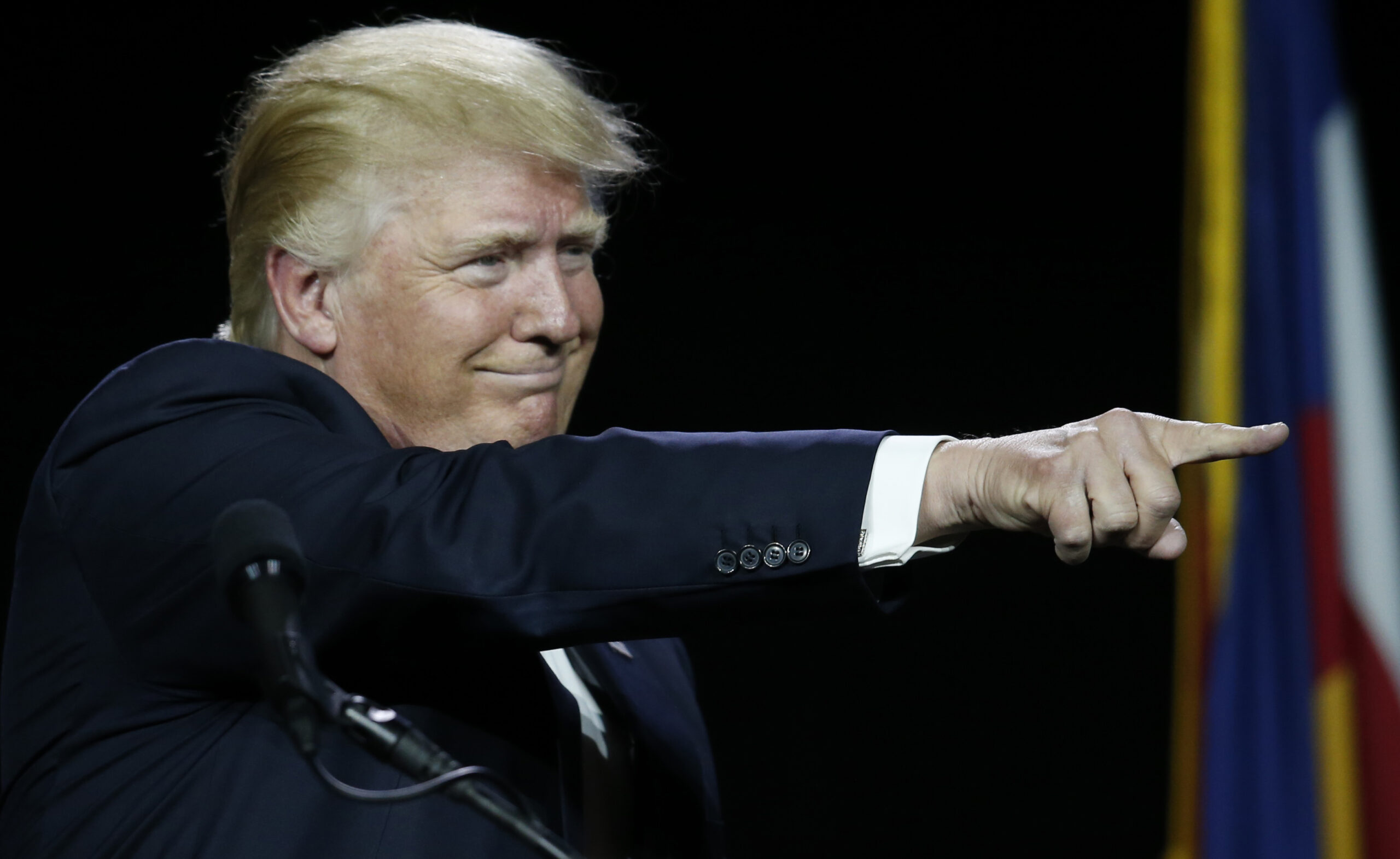 Republican presidential candidate Donald Trump points to supporters during the opening session of the Western Conservative Summit, Friday, July 1, 2016, in Denver. The summit, which brings together Republicans from across the West, runs through Sunday. (AP Photo/David Zalubowski)