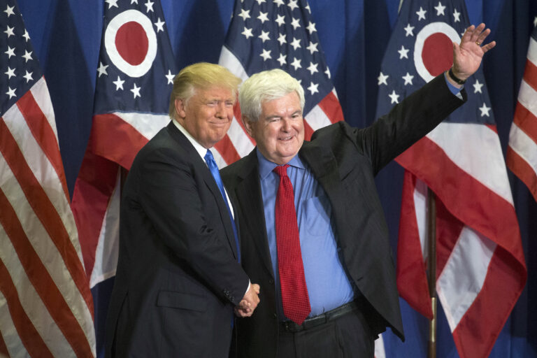 Republican presidential candidate Donald Trump, left, and former House Speaker Newt Gingrich, right, acknowledge the crowd during a campaign rally at the Sharonville Convention Center, Wednesday, July 6, 2016, in Cincinnati. (AP)