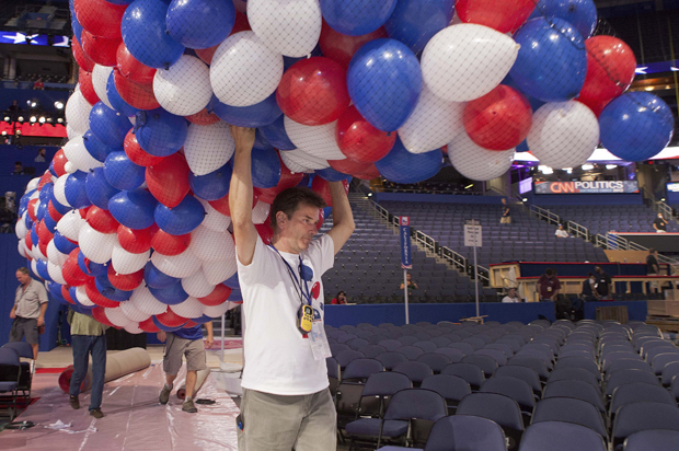 Balloons are carried across the convention floor in preparation for the 2012 Republican National Convention. (AP/David Ake)