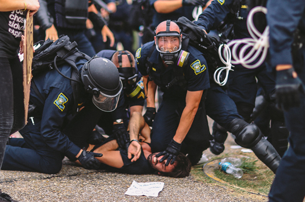 On Sunday July 10th, Baton Rouge Police violently arrest protester Max Geller. (Patrick Melon; @melontao)