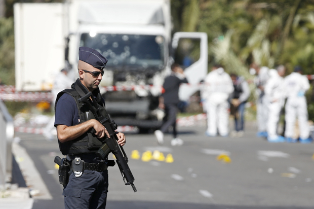 French police secure the area as the investigation continues in Nice, France, July 15, 2016. (Reuters/Eric Gaillard)
