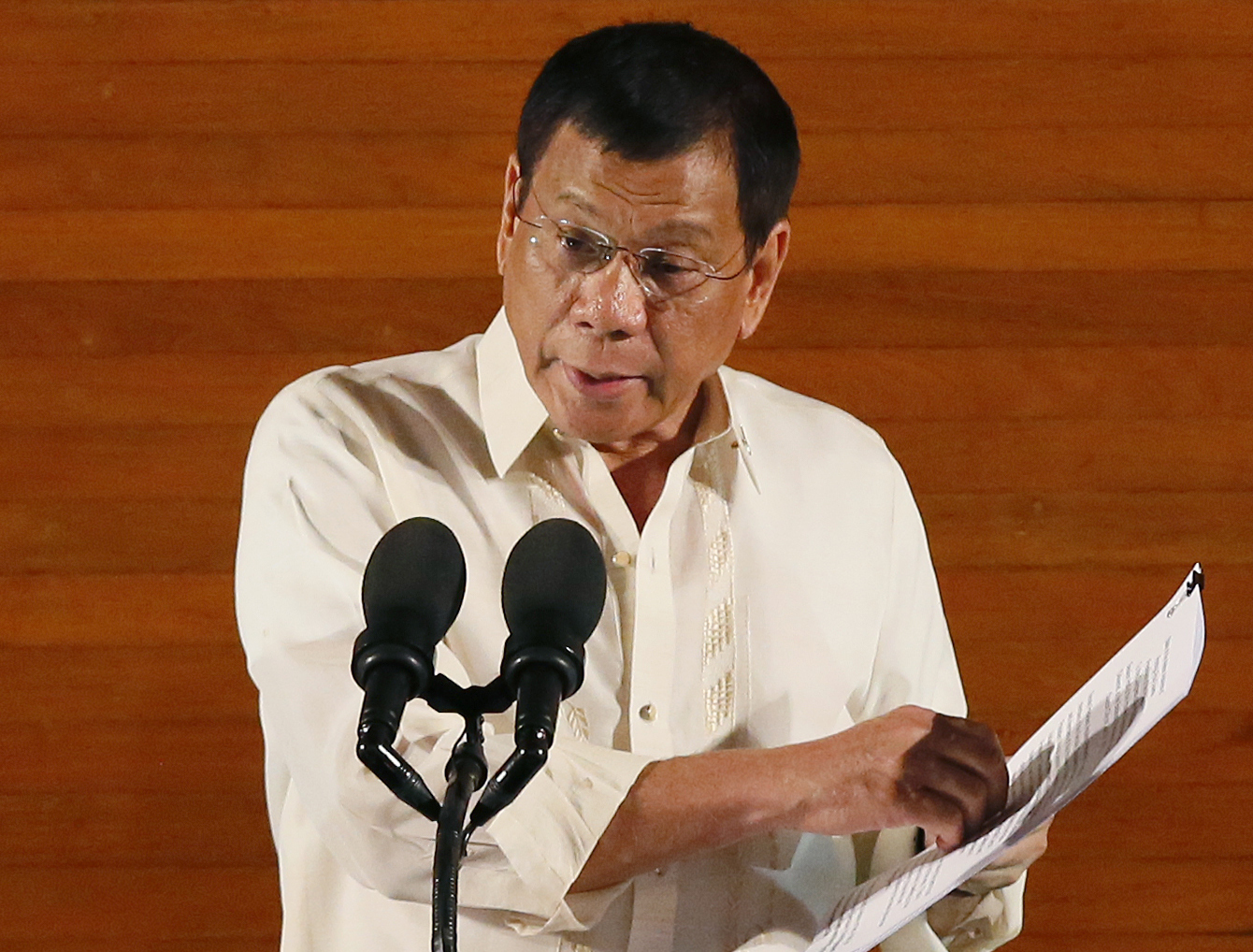 FILE - In this Monday,  July 25, 2016 file photo, Philippine President Rodrigo Duterte delivers his first State of the Nation Address before the joint session of the 17th Congress in suburban Quezon city, northeast of Manila, Philippines. Duterte on Thursday, July 28, threatened to withdraw a ceasefire order he gave three days ago after suspected communist rebels killed a government militiaman and wounded four others in an attack. (AP Photo/Bullit Marquez, File) (AP)