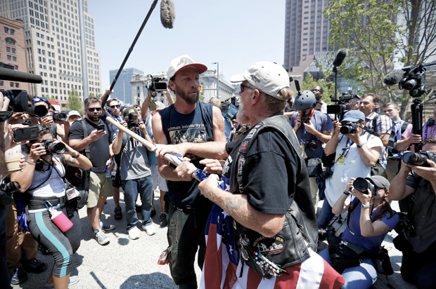 Protesters clash over the American flag, July 19, 2016, in Cleveland, during the Republican convention. (AP/Alex Brandon)