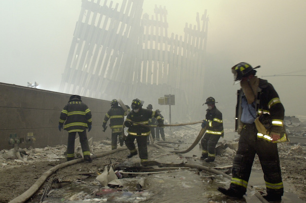 Firefighters at the World Trade Center, after the attacks on Sept. 11, 2001 (AP/Mark Lennihan)