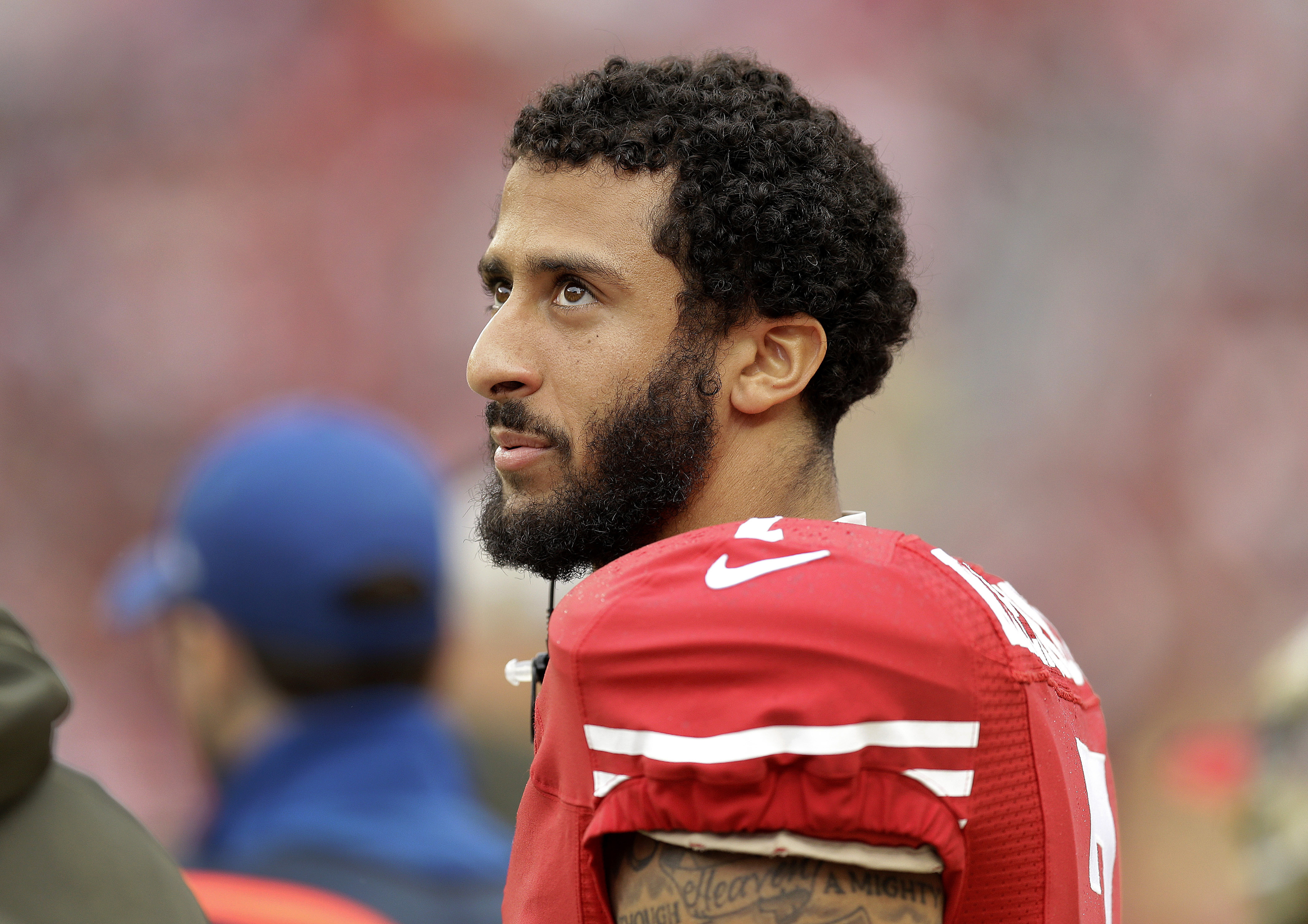 FILE - In this Nov. 8, 2015, file photo, San Francisco 49ers quarterback Colin Kaepernick stands on the field during an NFL football game against the Atlanta Falcons in Santa Clara, Calif. Kaepernick's protest of the national anthem over what he describes as oppression of minorities in the United States is apparently winning support from some veterans on Twitter under #VeteransForKaepernick. Kaepernick said he'll continue the protest during San Francisco's preseason game at San Diego on Thursday, Sept. 1, 2016. (AP Photo/Ben Margot, File) (AP)