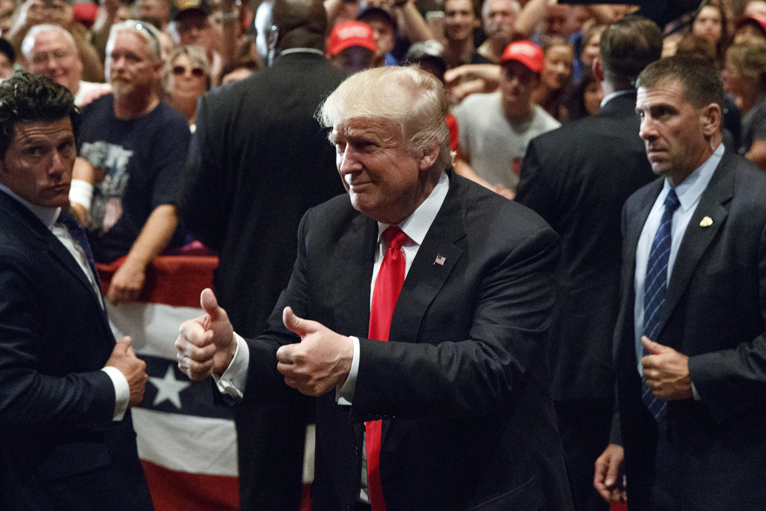 FILE - In this Aug. 12, 2016 file photo, Republican presidential candidate Donald Trump gives a thumbs up as he leaves a campaign rally in Altoona, Pa. While Donald Trump's chief economic pitch is decrying foreign trade, the audience for his argument is shrinking by the day in the state most pivotal to his shot at the presidency. (AP Photo/Evan Vucci, File) (AP)