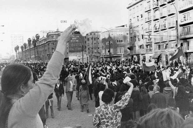 Anti-Marxist women wave white handkerchiefs in Santiago, Chile, Sept. 5, 1973, as they demand the resignation of President Salvador Allende. (AP)