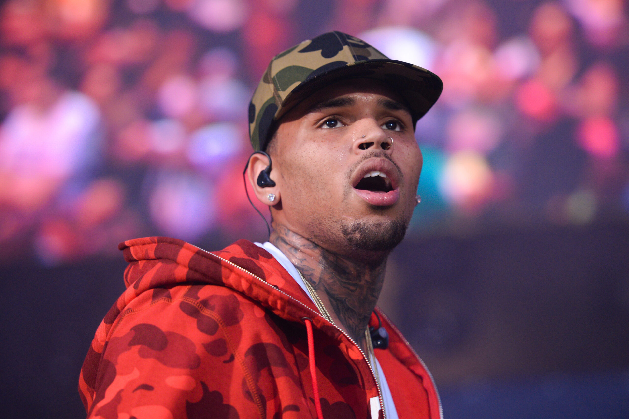 FILE - In this June 7, 2015, file photo, rapper Chris Brown performs at the 2015 Hot 97 Summer Jam at MetLife Stadium in East Rutherford, N.J. Authorities said officers responded to singer Brown's Los Angeles home early Tuesday, Aug. 30, 2016, after a woman called police seeking assistance. (Photo by Scott Roth/Invision/AP, File) (AP)