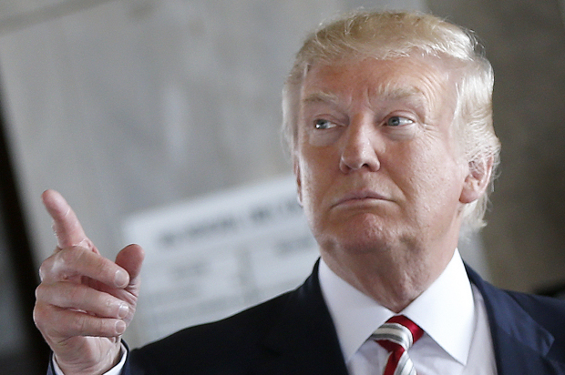 Republican presidential candidate Donald Trump gestures during a campaign stop at the Milwaukee County War Memorial Center in Milwaukee, Wis., Tuesday, Aug. 16, 2016. (AP Photo/Gerald Herbert) (AP/Gerald Herbert)