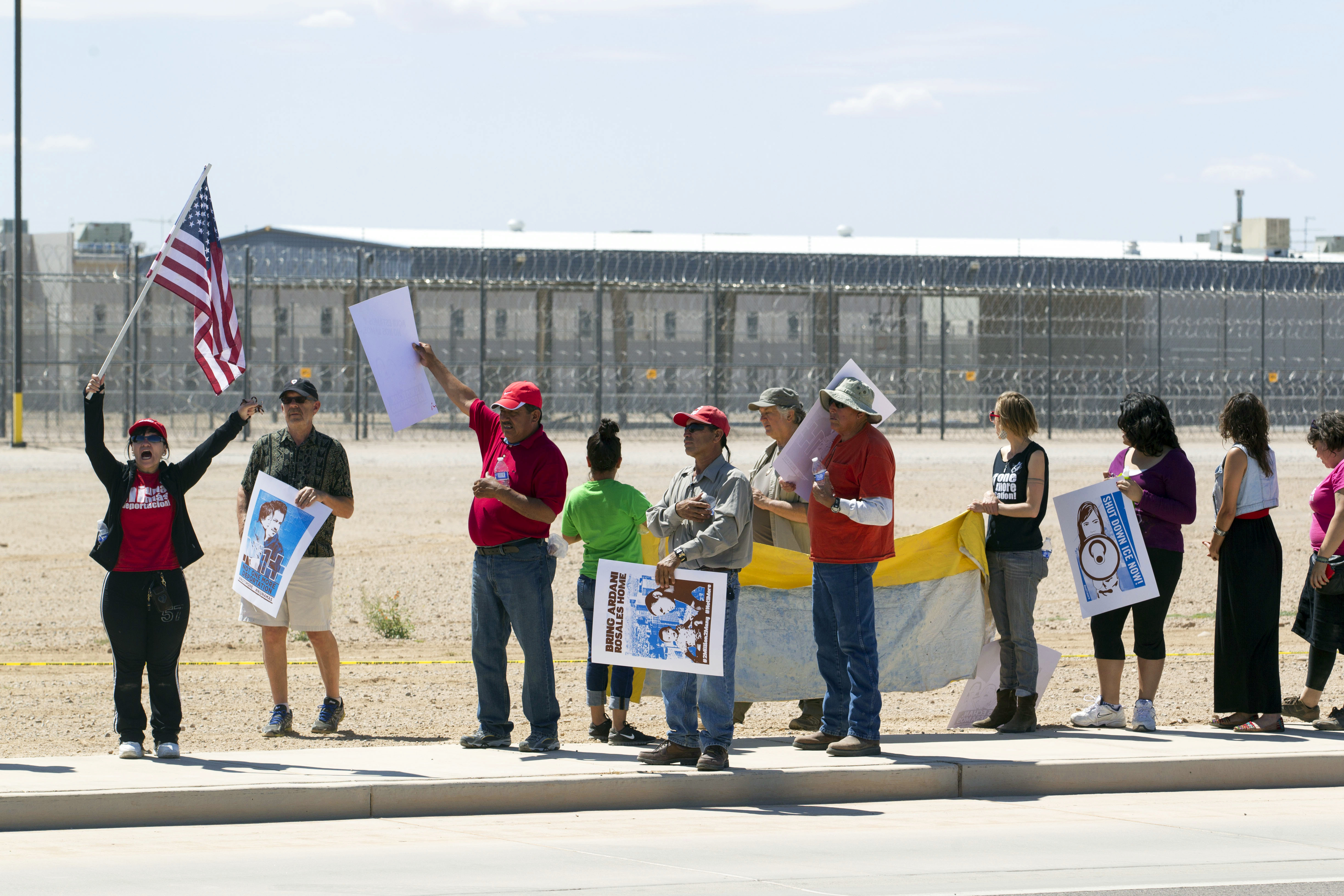 FILE - In this April 5, 2014, file photo, supporters of the immigrant advocacy group, Puente Movement, demonstrate outside the U.S. Immigration and Customs Enforcement detention center in Eloy, Ariz. (AP)