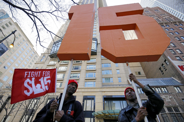 Demonstrators at a protest for a $15-an-hour nationwide minimum wage in Chicago, April 14, 2016. (Reuters/Jim Young)