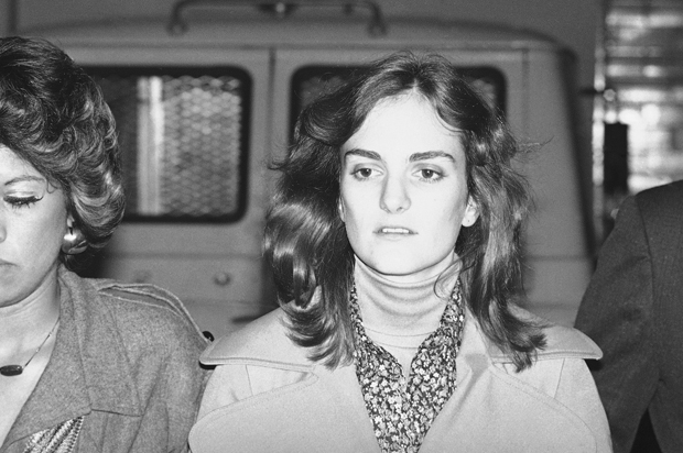 Patty Hearst leaves the San Francisco Federal Building, Feb. 13, 1976, during her trial on bank robbery charges. (AP)