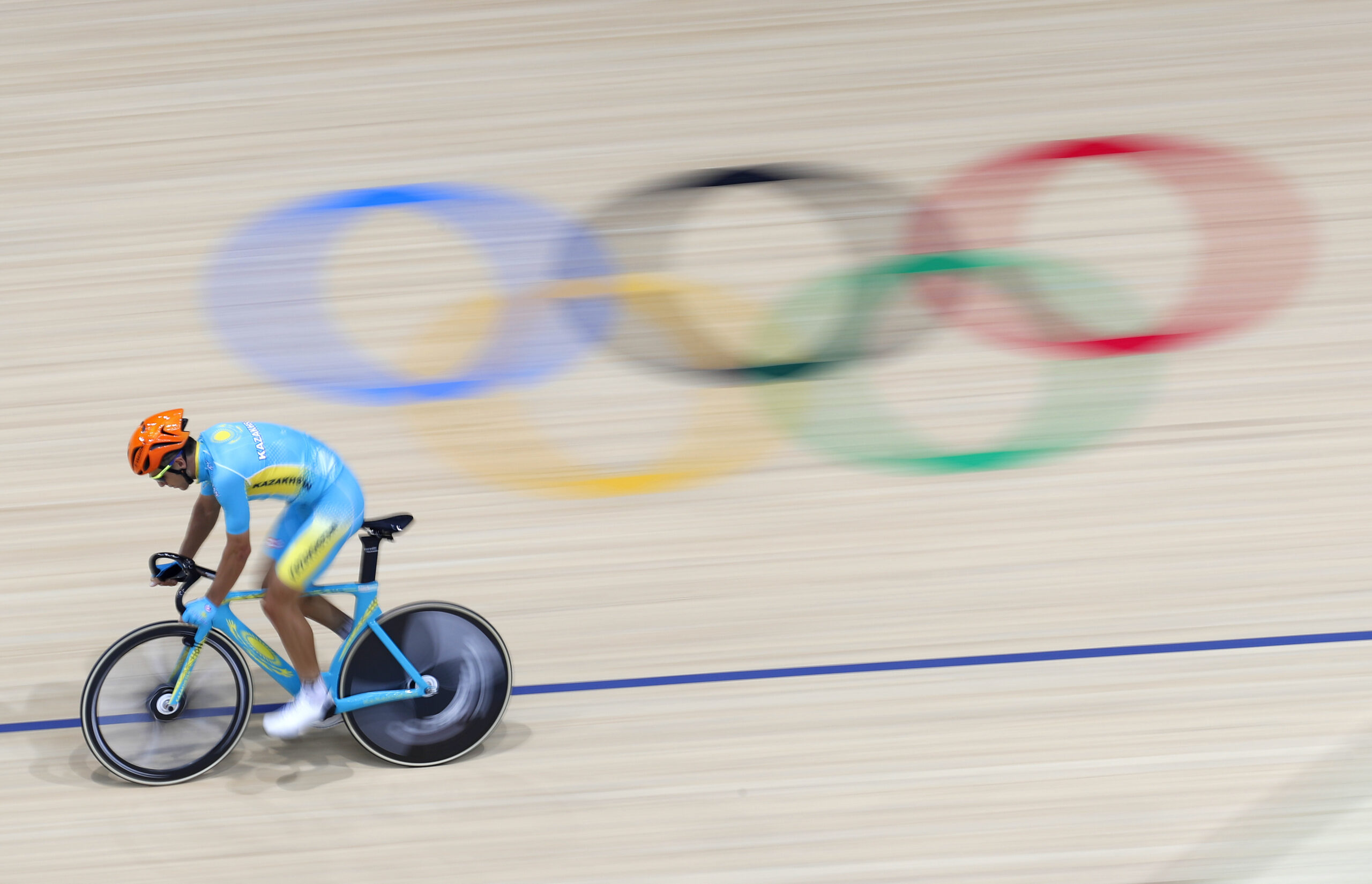 A member of the Kazakhstan men's track cycling team rounds the track during a training session inside the Rio Olympic Velodrome during the 2016 Olympic Games in Rio de Janeiro, Brazil, Tuesday, Aug. 9, 2016. (AP Photo/Patrick Semansky) (AP)