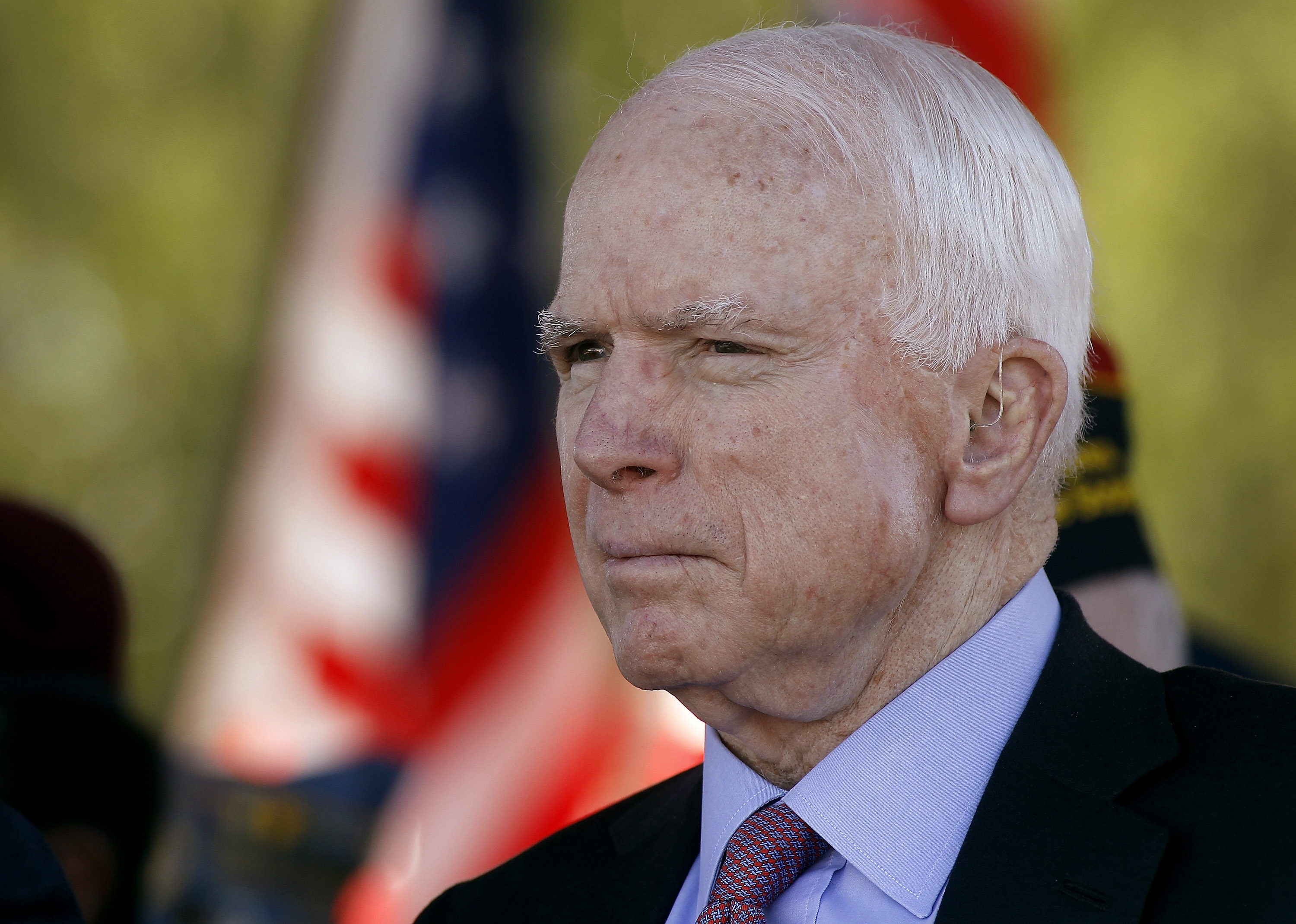 FILE - In this Monday, May 30, 2016, Sen. John McCain, R-Ariz, looks on during a Phoenix Memorial Day Ceremony at the National Memorial Cemetery of Arizona in Phoenix. Eight years after stumping across the nation as the Republican Party's presidential candidate, McCain is back on the campaign trail in his home state as he faces a primary challenge and a strong Democratic opponent in the general election. (AP Photo/Ralph Freso, File) (AP)