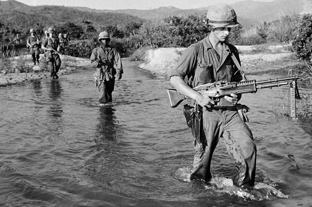 U.S. Marines on a patrol 15 miles southwest of Da Nang airbase in Vietnam, May 20, 1965. (AP/John T. Wheeler)