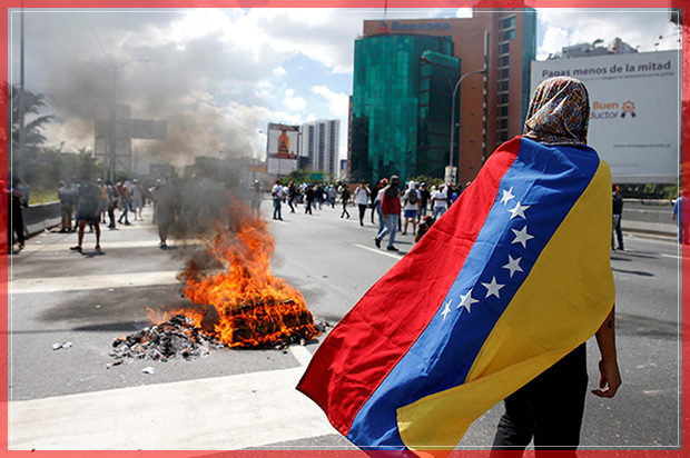 Protesters clash with riot police during a rally to demand a referendum to remove Venezuela's President Nicolas Maduro in Caracas, Venezuela, September 1, 2016.  REUTERS/Carlos Garcia Rawlins     TPX IMAGES OF THE DAY      - RTX2NTR7 (Reuters)