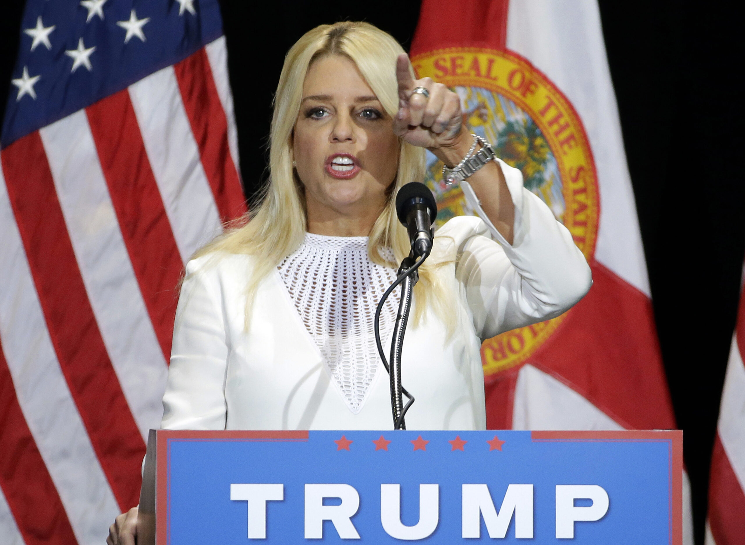 Florida Attorney General Pam Bondi gestures as he speaks to supporters of Republican presidential candidate Donald Trump during a rally Saturday, June 11, 2016, in Tampa, Fla. (AP Photo/Chris O'Meara) (AP)