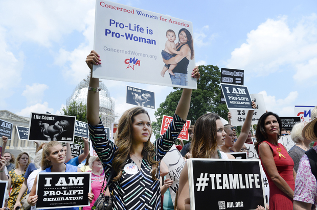 Anti-abortion activists protest federal funding for Planned Parenthood in front of the U.S. Capitol, July 28, 2015. (Getty/Olivier Douliery)