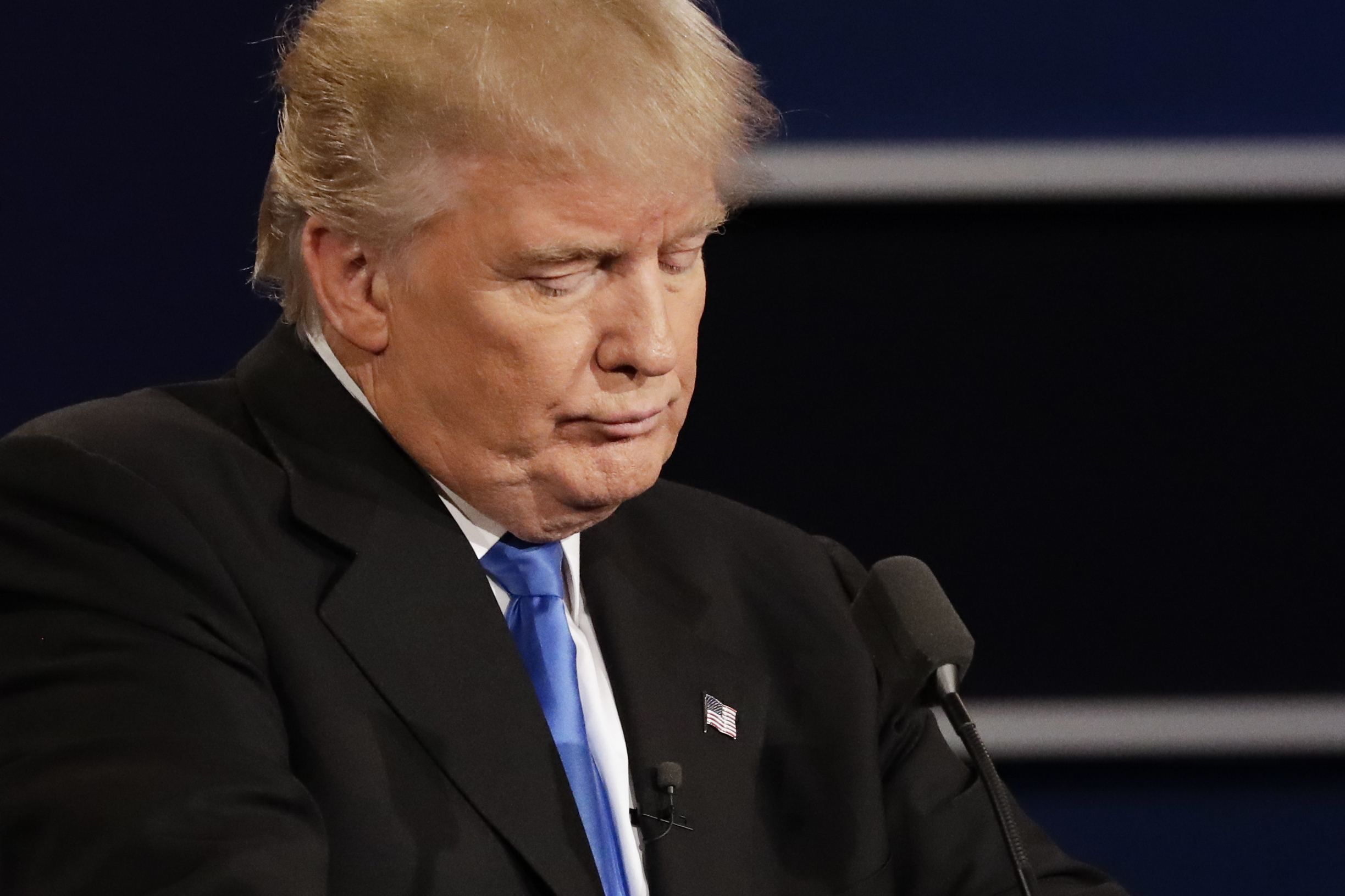 Republican presidential nominee Donald Trump listens to an answer to a question from Democratic presidential nominee Hillary Clinton during the presidential debate at Hofstra University in Hempstead, N.Y., Monday, Sept. 26, 2016. (AP Photo/David Goldman) (AP)