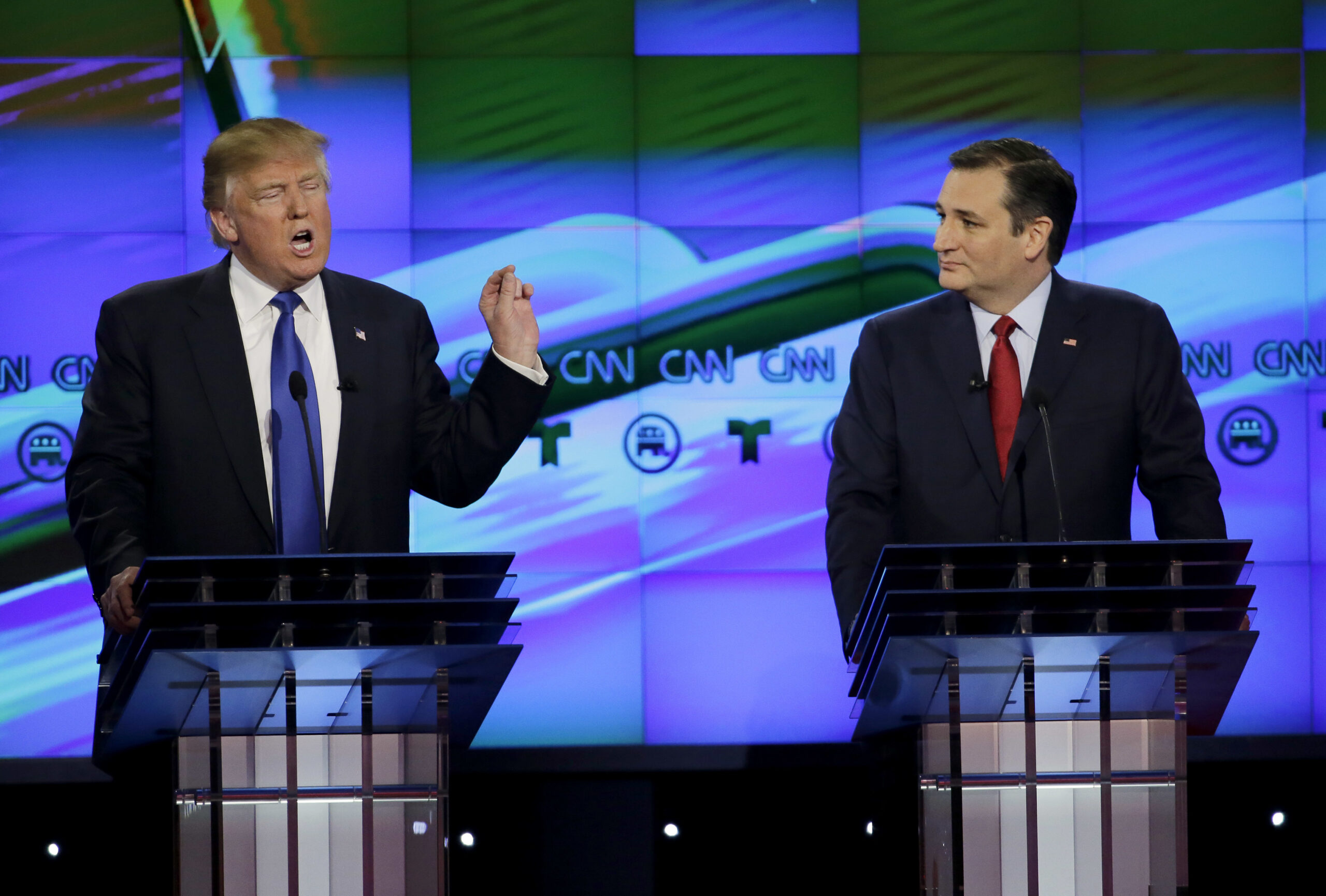 FILE - In this Feb. 25, 2016 file photo, Sen. Ted Cruz, R-Texas listen as Donald Trump speaks during a Republican presidential primary debate at The University of Houston in Houston. Cruz announced Friday, Sept. 23, 2016, he will vote for Donald Trump, a dramatic about-face for the Texas senator who previously called the New York businessman a "pathological liar" and "utterly amoral." (AP Photo/David J. Phillip, File) (AP Photo/David J. Phillip, File)