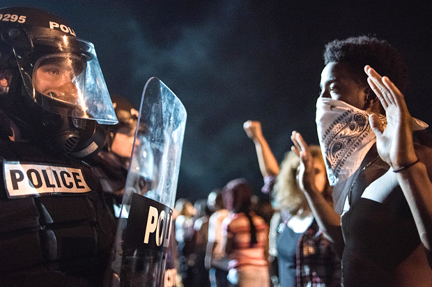 Police officers face off with protestors in Charlotte, N.C., September 21, 2016. (Getty/Sean Rayford)