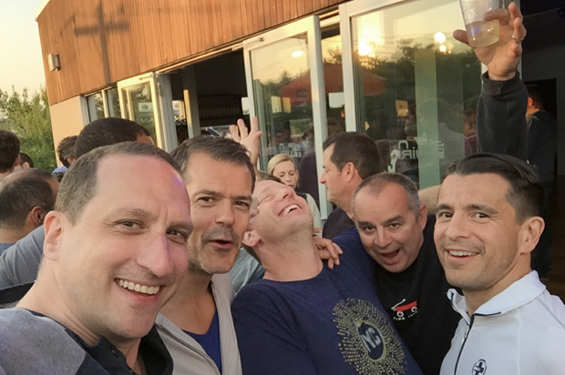 The author on Fire Island, center, laughing, with his housemates.