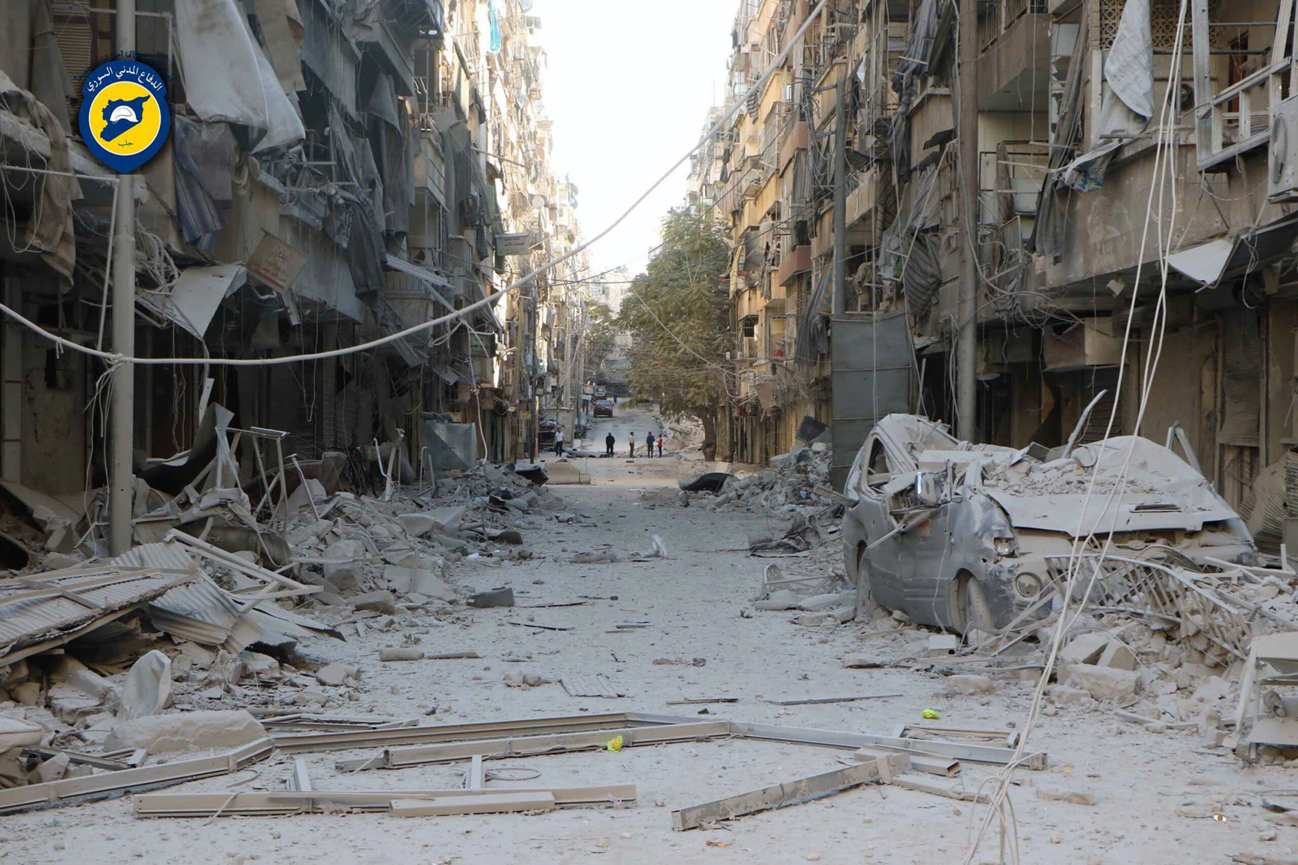 In this photo provided by the Syrian Civil Defense group known as the White Helmets, shows heavily damaged buildings after airstrikes hit in Aleppo, Syria. (AP)