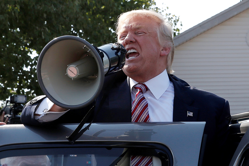 Republican presidential nominee Donald Trump speaks to supporters through a bullhorn during a campaign stop at the Canfield County Fair in Canfield, Ohio, U.S., September 5, 2016.  REUTERS/Mike Segar (Reuters)