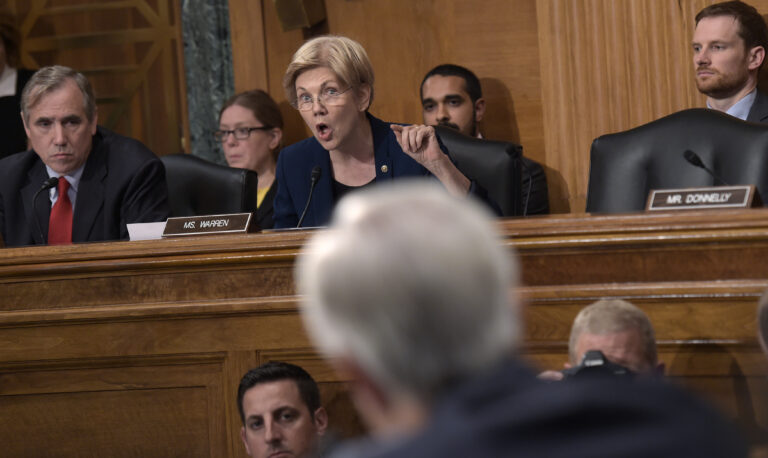 Senate Banking Committee member Sen. Elizabeth Warren questions Wells Fargo Chief Executive Officer John Stumpf, on Capitol Hill in Washington, Tuesday, Sept. 20, 2016, during the committee's hearing. (AP)