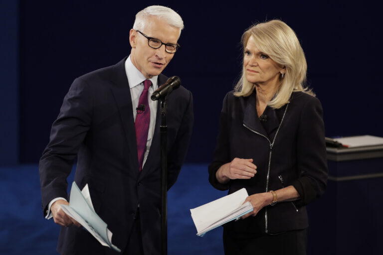 Moderators Anderson Cooper, of CNN, and Martha Raddatz, of ABC News talk to the audience before the second presidential debate at Washington University in St. Louis, Sunday, Oct. 9, 2016. (AP Photo/Julio Cortez) (AP)