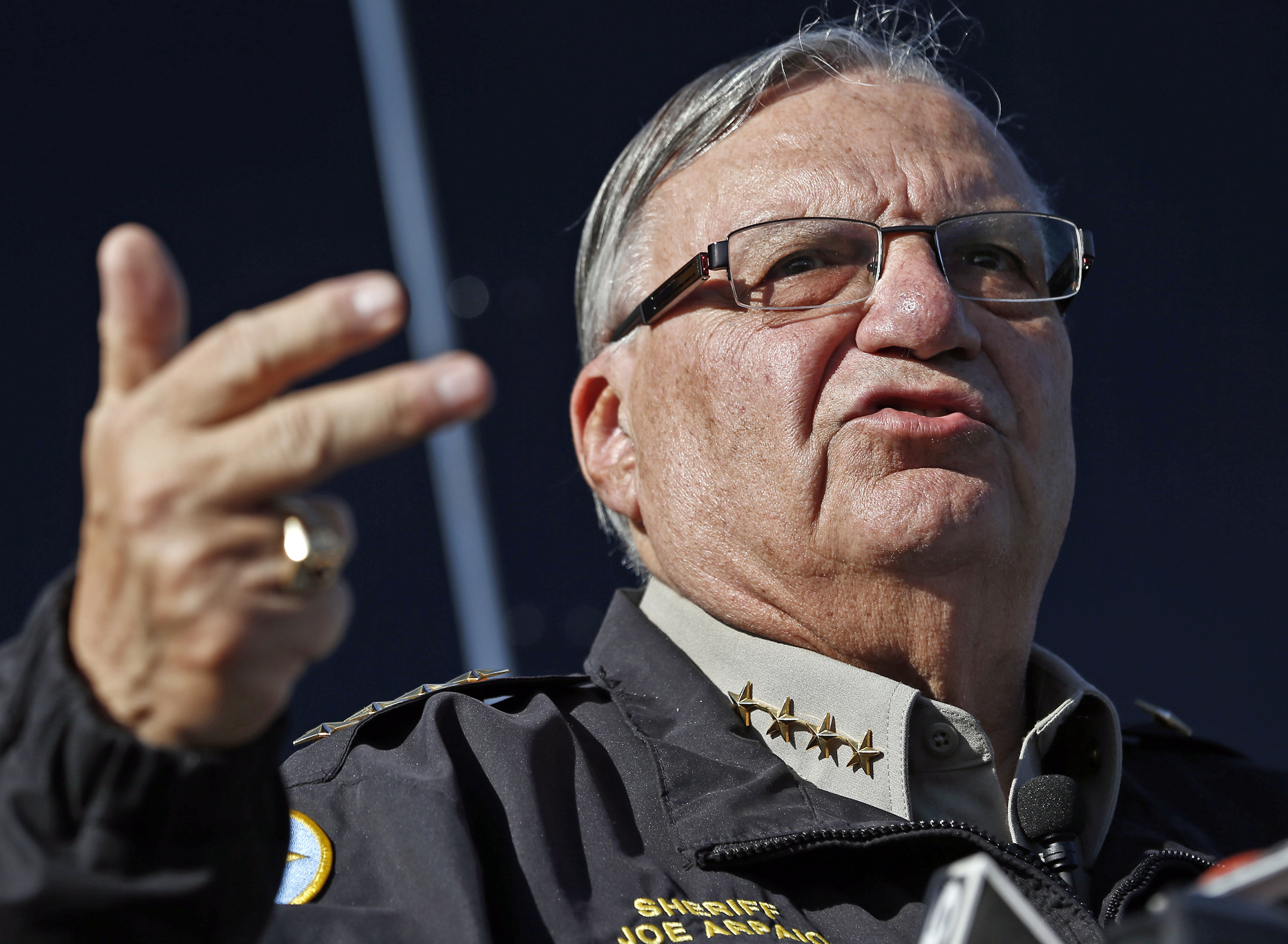 FILE - In this Jan. 9, 2013, file photo, Maricopa County Sheriff Joe Arpaio speaks to reporters in Phoenix, Ariz. Arpaio's lawyers want a federal judge to recuse himself from all future proceedings in a racial-profiling case. Attorney Charles Cooper says U.S. District Judge Murray Snow "has engaged in improper private, off-the-record meetings and communications about the merits of the case with the court-appointed monitor" investigating the sheriff's office. The motion filed Wednesday, Oct. 26, 2016, also seeks removal of the monitor. (AP Photo/Ross D. Franklin, File)