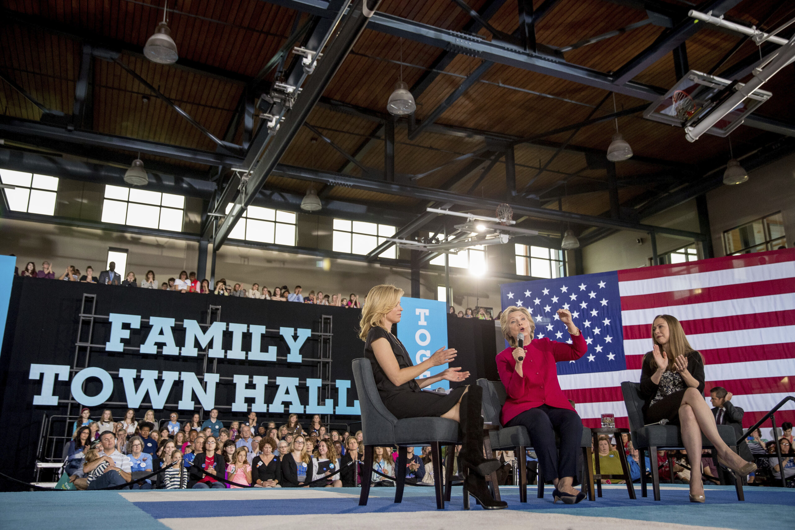 In this Oct. 4, 2016, photo, Democratic presidential candidate Hillary Clinton, center, accompanied by her daughter Chelsea Clinton, right, and actress Elizabeth Banks, speaks at a town hall at the Haverford Community Recreation and Environmental Center in Haverford, Pa. Even if your daughters don't pay much attention to politics, they'd be hard-pressed to have missed Donald Trump's attack of a former Miss Universe’s weight or comments about a 400-pound hacker. It resonated with a 15-year-old who said this week the words damage girls' body image and asked Clinton how to help. (AP Photo/Andrew Harnik) (AP)