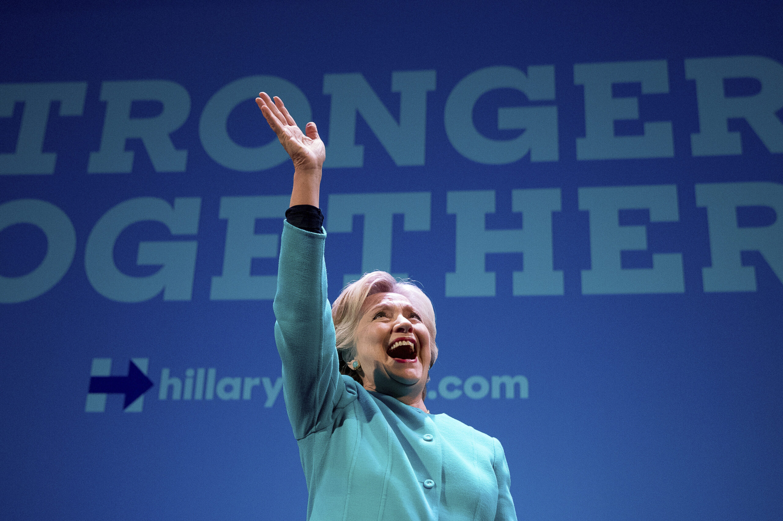 Democratic presidential candidate Hillary Clinton waves as she takes the stage to speak at a fundraiser at the Paramount Theatre in Seattle, Friday, Oct. 14, 2016. (AP Photo/Andrew Harnik) (AP)