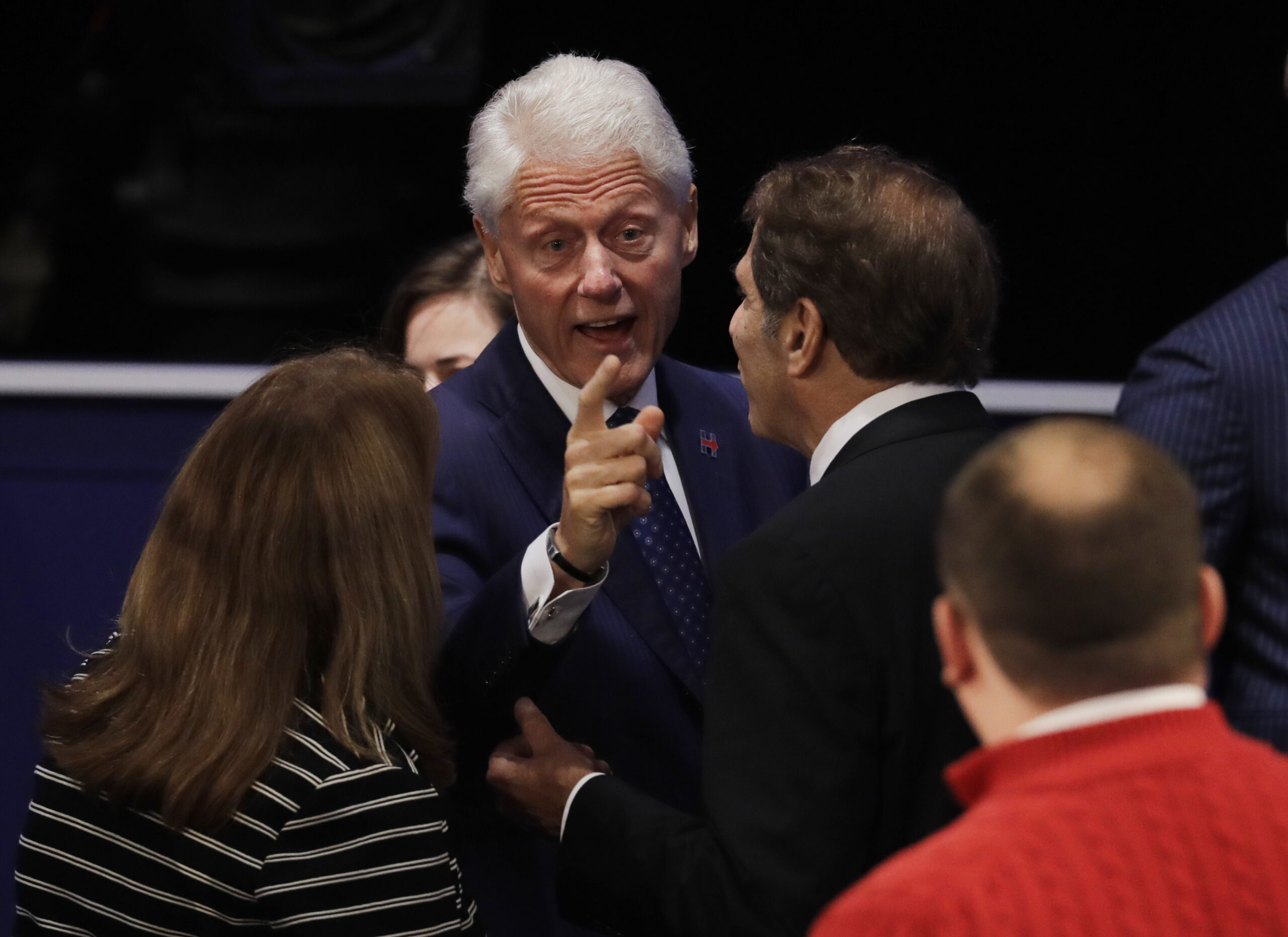 Bill Clinton speaks to a town hall participant following during the second presidential debate between Republican presidential nominee Donald Trump and Democratic presidential nominee Hillary Clinton at Washington University in St. Louis, Sunday, Oct. 9, 2016. (AP Photo/Patrick Semansky) (AP)