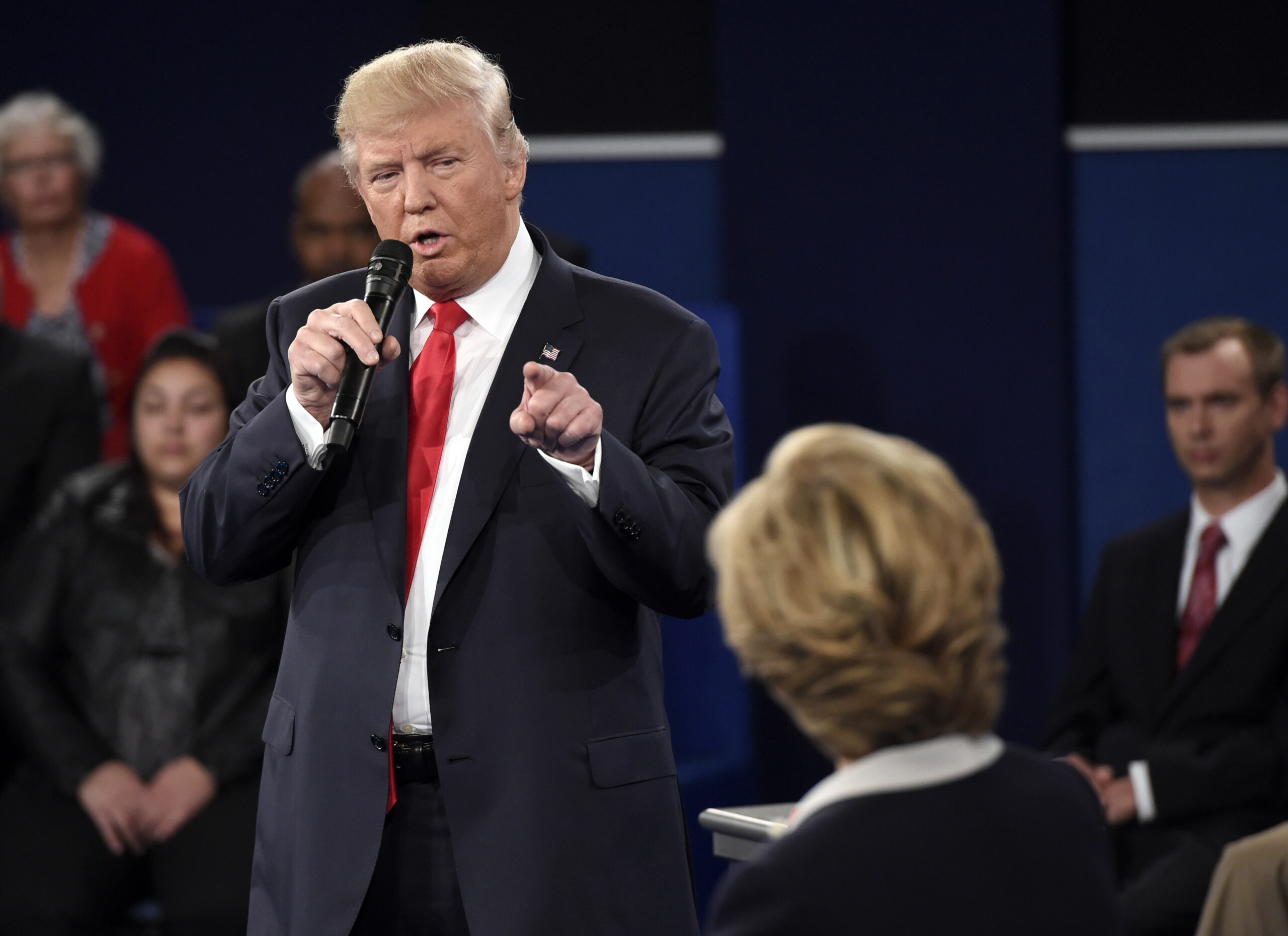 Republican presidential nominee Donald Trump points at Democratic presidential nominee Hillary Clinton as he speaks during the second presidential debate at Washington University in St. Louis, Sunday, Oct. 9, 2016. (Saul Loeb/Pool via AP) (AP)
