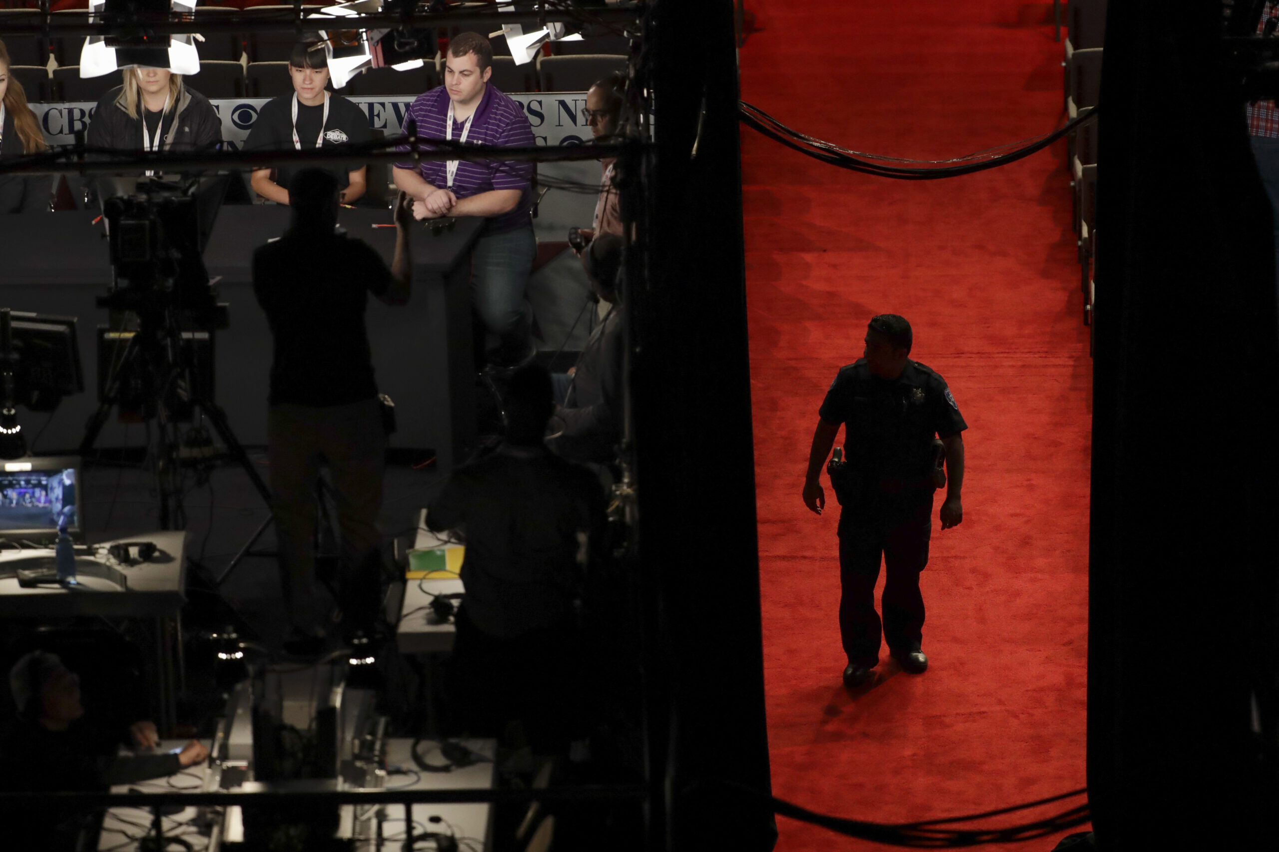 A law enforcement officer walks in the aisles during a rehearsal for the third presidential debate between Republican presidential nominee Donald Trump and Democratic presidential nominee Hillary Clinton at UNLV in Las Vegas, (AP)