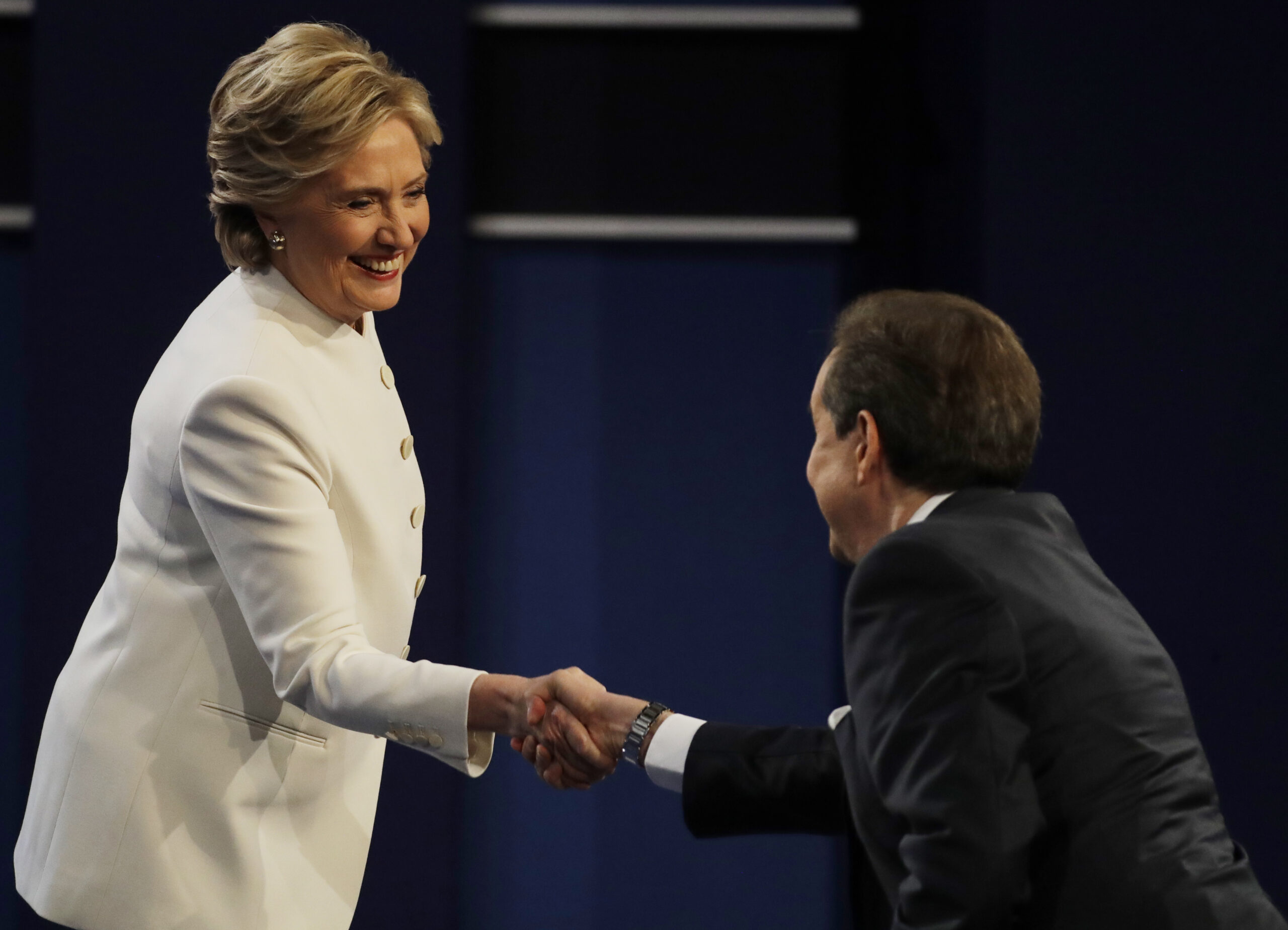 Democratic presidential nominee Hillary Clinton speaks shakes hands with moderator Chris Wallace following the third presidential debate with Republican presidential nominee Donald Trump at UNLV in Las Vegas, Wednesday, Oct. 19, 2016. (AP Photo/Patrick Semansky) (AP)
