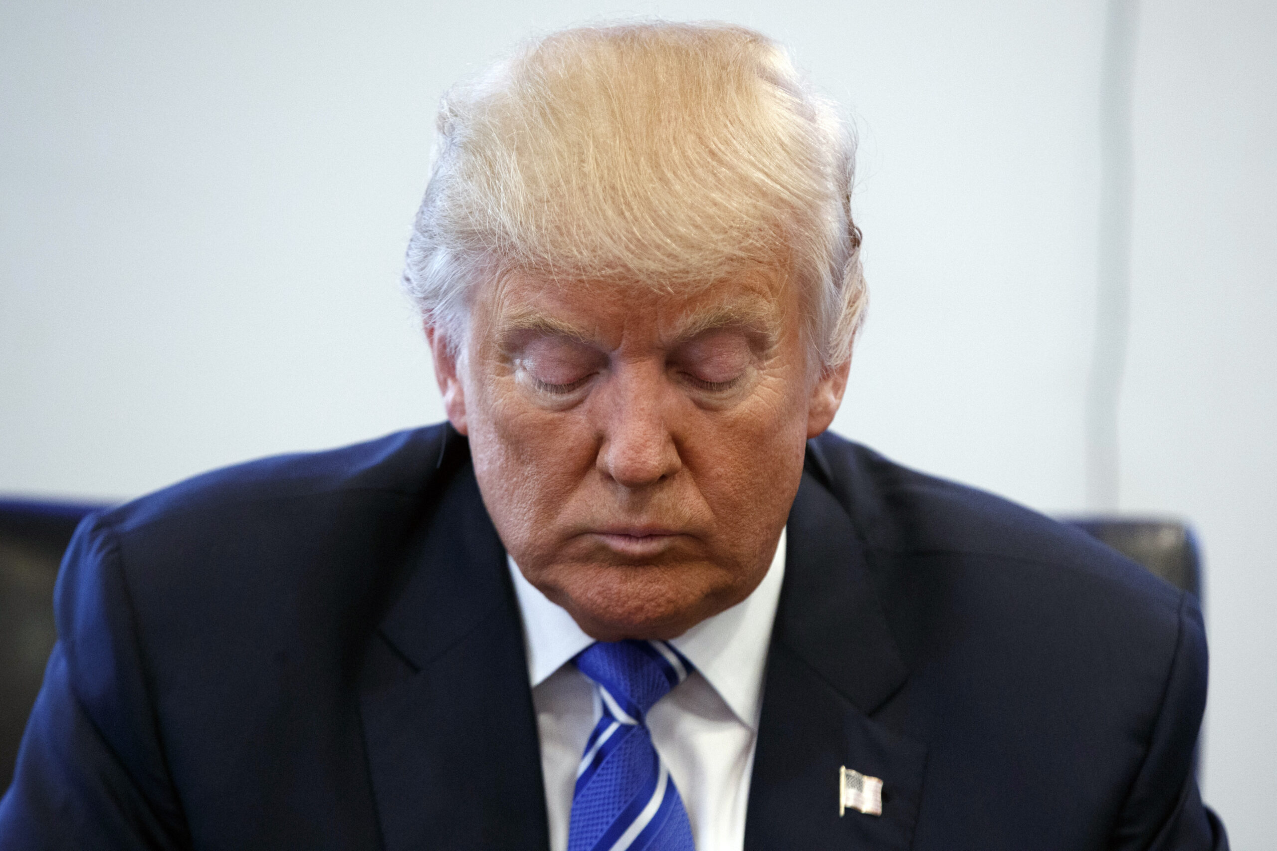 Republican presidential candidate Donald Trump pauses during a meeting with members of the National Border Patrol Council at Trump Tower, Friday, Oct. 7, 2016, in New York. (AP)