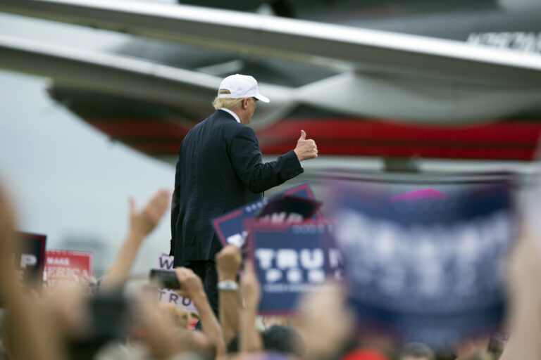 Republican presidential candidate Donald Trump walks to his plane after speaking during a campaign rally, Wednesday, Oct. 12, 2016, in Lakeland, Fla. (AP Photo/ Evan Vucci) (AP)