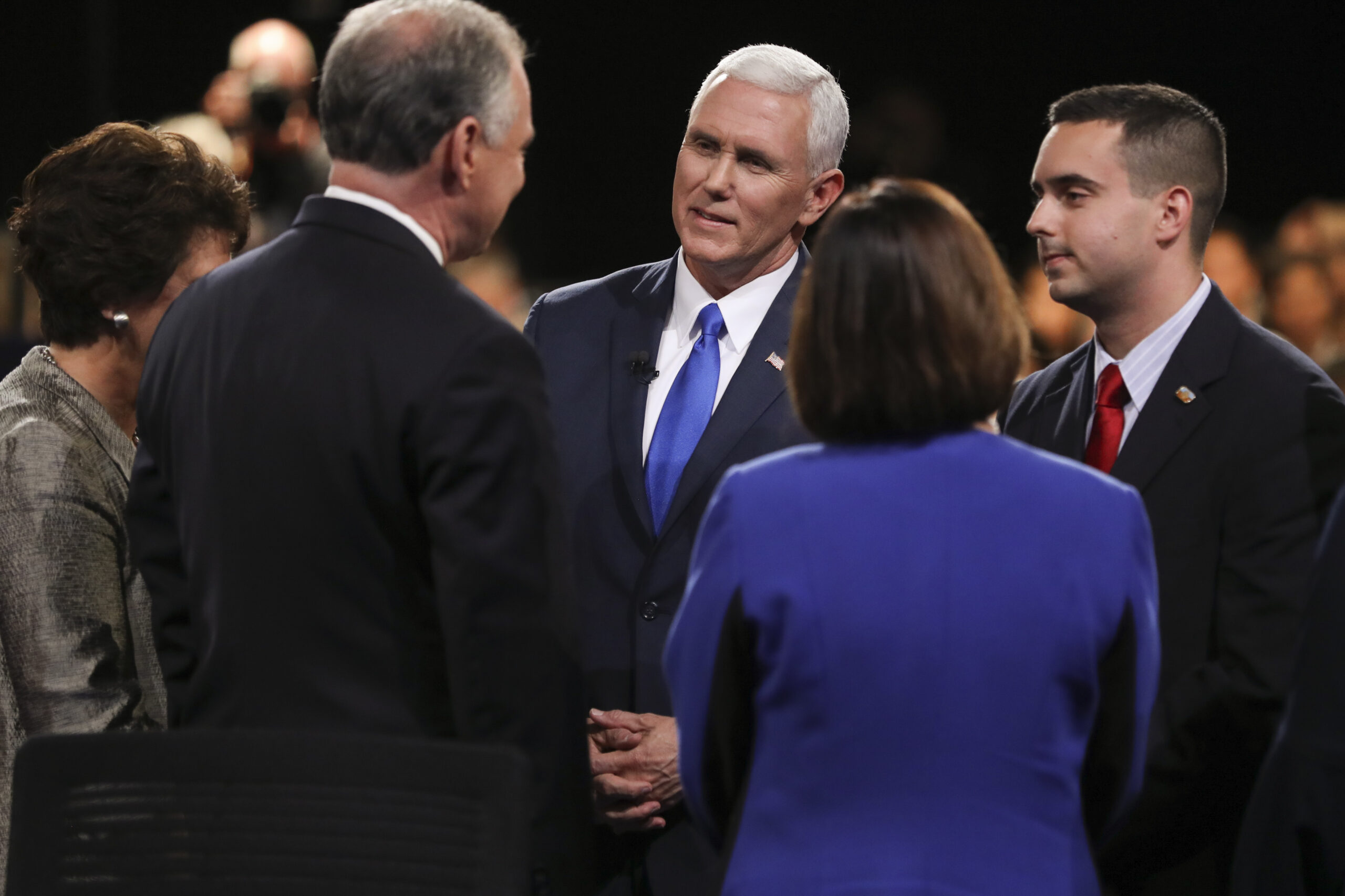 Republican vice-presidential nominee Gov. Mike Pence and Democratic vice-presidential nominee Sen. Tim Kaine, left, talk after the vice-presidential debate at Longwood University in Farmville, Va., Tuesday, Oct. 4, 2016. (Joe Raedle/Pool via AP) (AP)