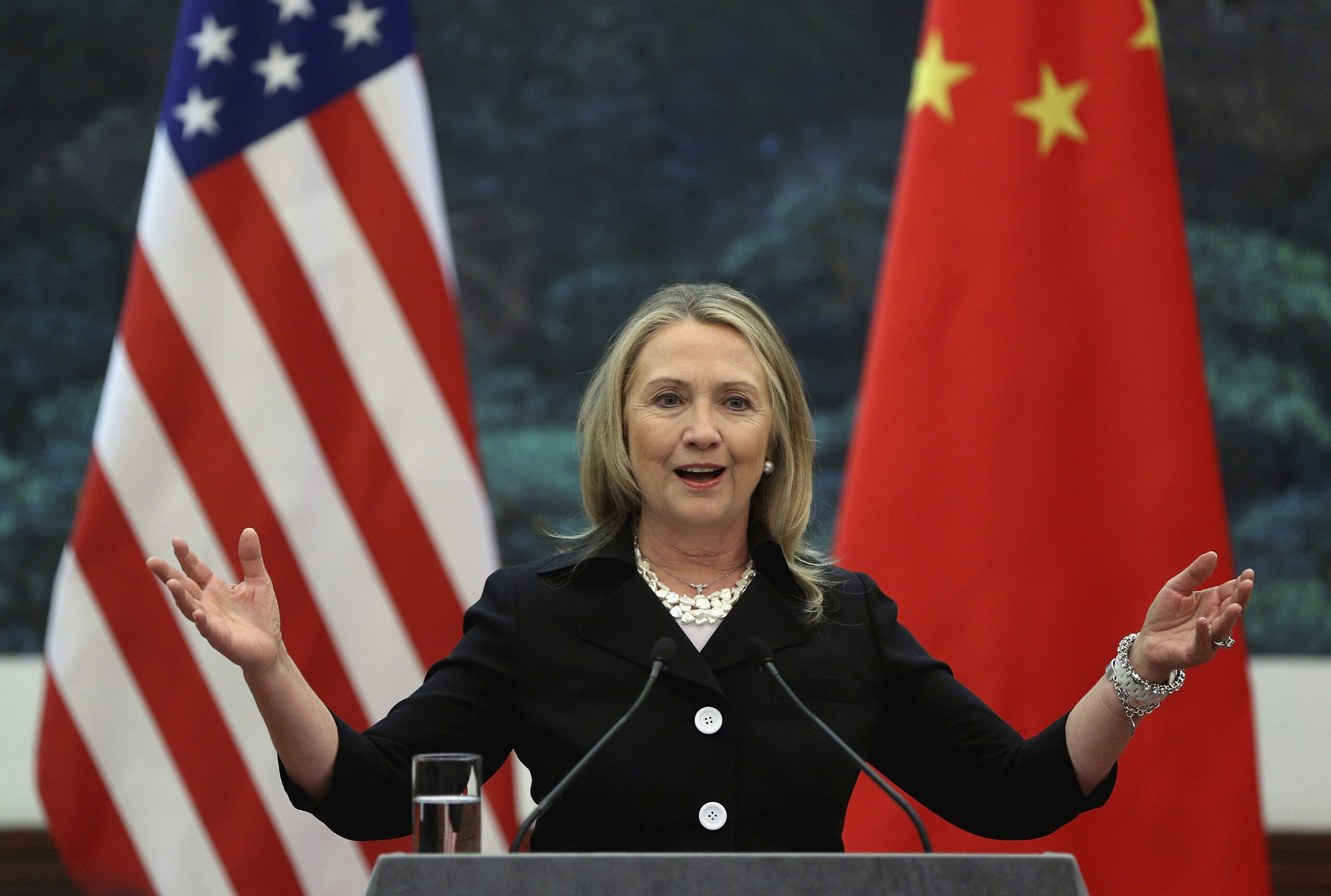 FILE - In this Sept. 5, 2012 file photo, then U.S. Secretary of State Hillary Clinton speaks during her joint conference with Chinese Foreign Minister Yang Jiechi at the Great Hall of the People in Beijing when talks between Clinton and Chinese leaders failed to narrow gaps on how to end the crisis in Syria and how to resolve Beijing's territorial disputes with its smaller neighbors over the South China Sea. Clinton privately said the U.S. would "ring China with missile defense" if the Chinese government failed to curb North Korea's nuclear program, a potential hint at how the former secretary of state would act if elected president. Clinton's remarks were revealed by WikiLeaks in a hack of the Clinton campaign chairman's personal account. (Feng Li/Pool Photo via AP, File) (AP)